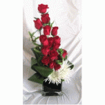 Creative Rose arrangement in glass vase